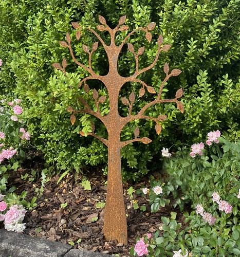 Tree with ground tip in a garden